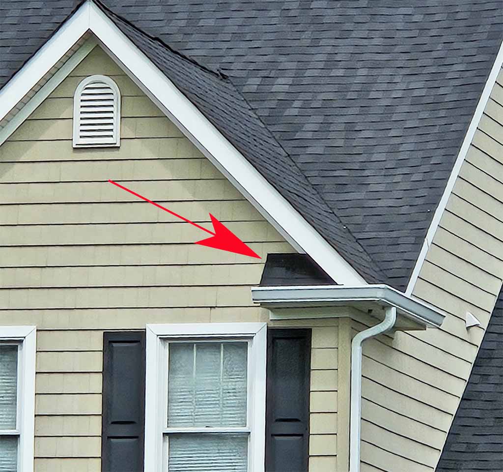 Roof eaves with gutters