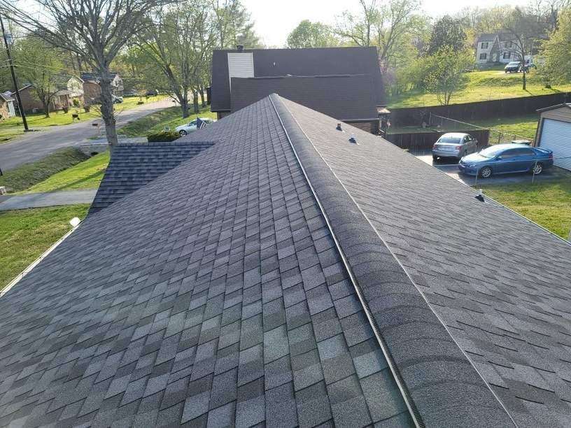 Ridge cap shingles installed on roof
